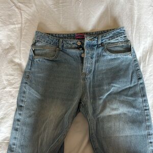 Edikted Light Blue Ripped Jeans with Hip Cutouts